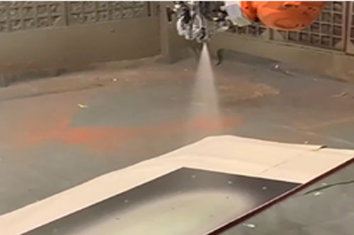 sprayable foaming adhesive